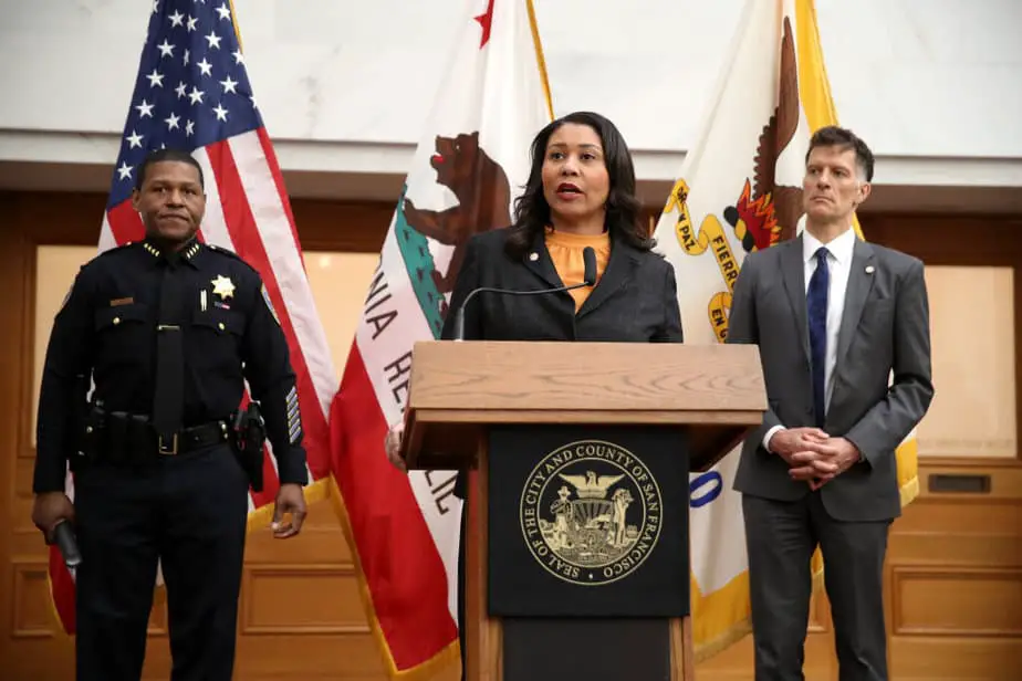 San Francisco Mayor London Breed (C) speaks during a press conference as San Francisco police chief William Scott (L) and San Francisco Department of Public Health director Dr. Grant Colfax (R) look on at San Francisco City Hall on March 16, 2020 in San Francisco, California. JUSTIN SULLIVAN/GETTY IMAGES