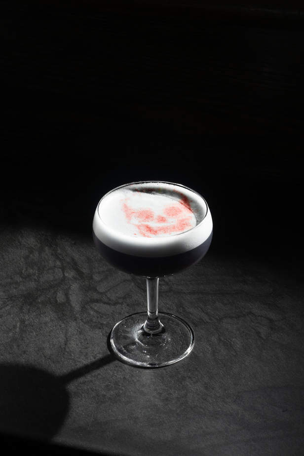 “The Rose of Death” from Trick Dog’s new menu with Idle Hand Tattoo. A Elyx vodka, Lillet Blanc, Combier blue curaçao, Gabriel Boudier crème de cassis, carrot, ginger, lime, white pepper, egg white, served up.
