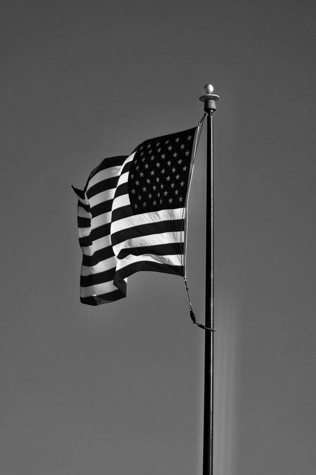 what-does-a-black-and-white-american-flag-symbolize